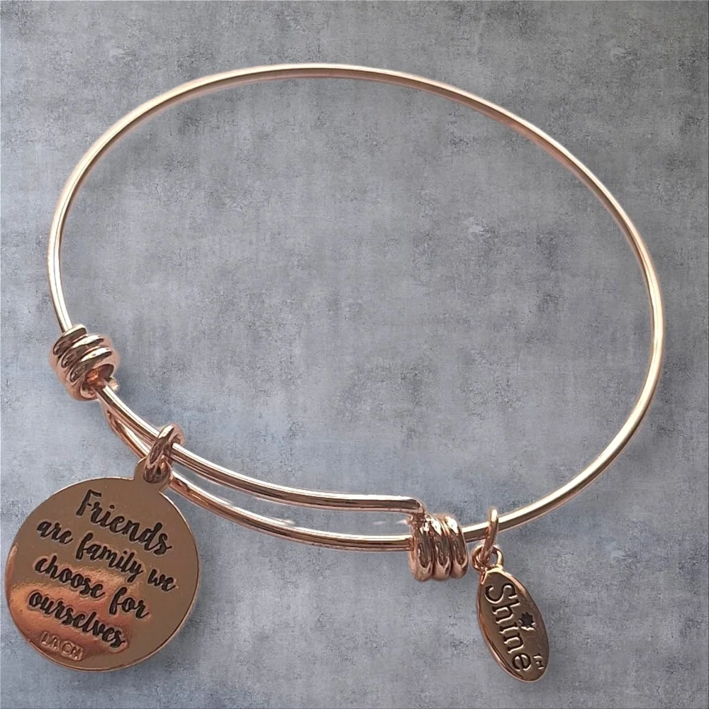 Unwritten Rose Gold Bangle Bracelet with Charms